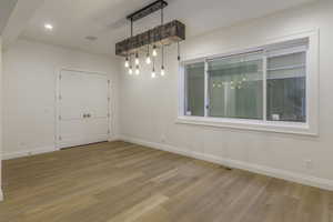 Spare room featuring light hardwood / wood-style floors