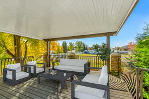 Wooden terrace with outdoor lounge area