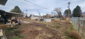 View of yard featuring a storage shed