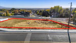 Birds eye view of property with a mountain view