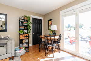 Dining space featuring hardwood / wood-style flooring