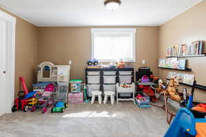 Playroom featuring carpet