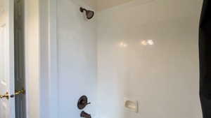 2nd Bathroom details featuring shower / bathing tub combination