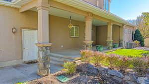 Property entrance with covered porch