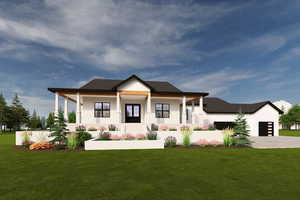 View of front of house with covered porch, a garage, and a front lawn