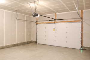 Garage featuring a MyQ garage door opener