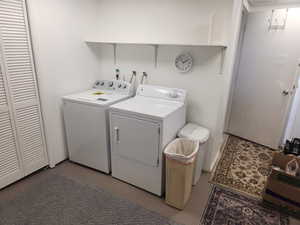 Laundry area featuring washing machine and dryer