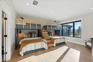 Bedroom with wood-type flooring