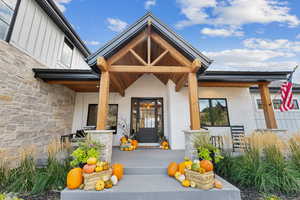 Entrance to property with a porch