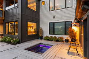 Exterior space featuring an in ground hot tub