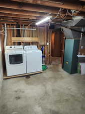 Basement with washer and clothes dryer