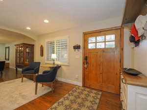 Entryway featuring dark hardwood / wood-style flooring