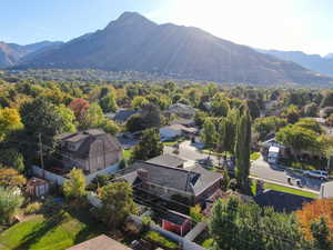 Birds eye view of property with a mountain view