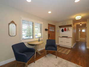 Sitting room featuring wood-type flooring