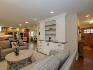 Living room featuring hardwood / wood-style flooring