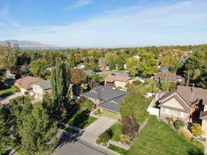 Birds eye view of property with a mountain view