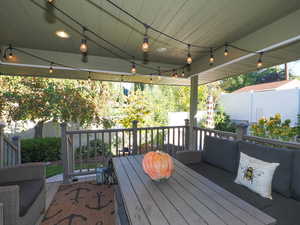 Wooden deck with an outdoor hangout area