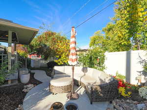 View of patio featuring an outdoor hangout area