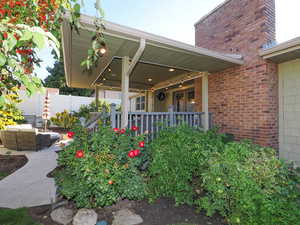 View of patio featuring french doors and an outdoor living space