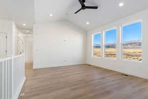 Open floorplan with vaulted ceilings and plenty of natural light