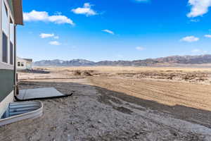 View of yard with a mountain view