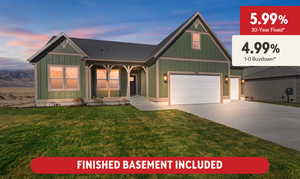 View of front of home featuring concrete driveway and a front lawn