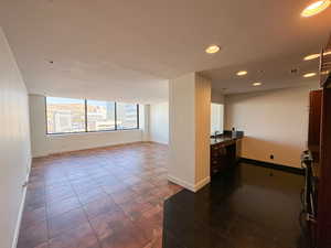 Interior space featuring tile patterned floors and sink