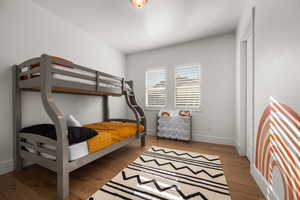 Bedroom with wood-type flooring