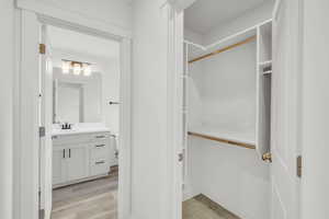 Interior space with hardwood / wood-style floors and vanity