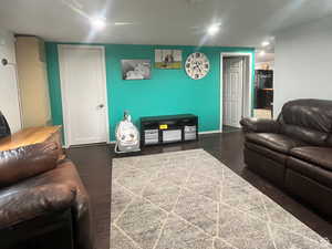 Living room with dark wood-style floors