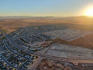 Aerial view at dusk featuring a mountain view