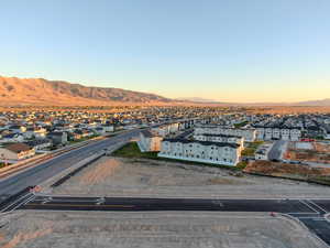 Aerial view at dusk featuring a mountain view