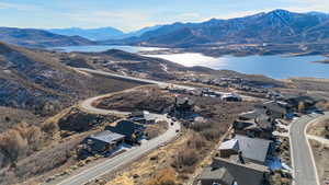 Bird's eye view featuring a water and mountain view