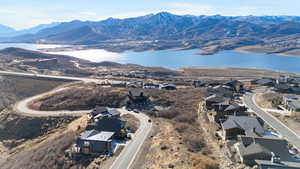 Birds eye view of property with a mountain view