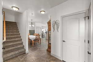 Entrance foyer featuring a chandelier