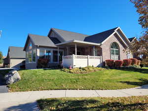 View of front of home featuring a front yard