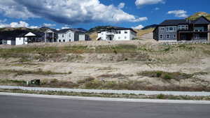 View of yard with a mountain view