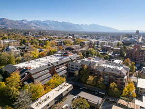 Birds eye view of property with a mountain view