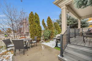 View of patio / terrace with views of the pond