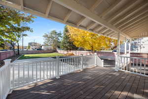 Wooden terrace with a lawn