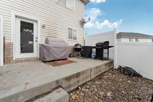 Backyard view of patio / terrace with grilling area