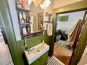 Bathroom with wood-type flooring and vanity