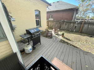 Wooden deck with a grill