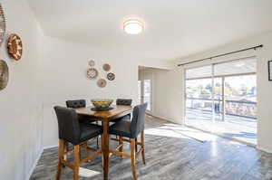 Dining area featuring hardwood / wood-style floors