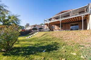 View of yard featuring a Trex deck