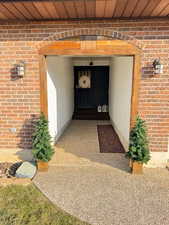 View of covered property entrance