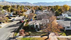 Birds eye view of property with a mountain view