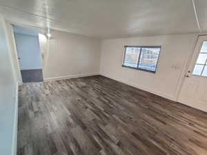 Interior space with dark wood-type flooring