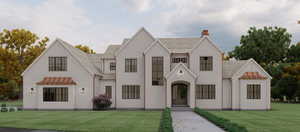 View of front of property with a front lawn