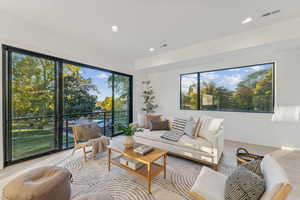 Living room with light wood-type flooring